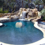 Custom Grottos, Waterfalls and Faux Rock Swimming Pools by Sammet Pools in South Florida covering Dade, Broward & Palm Beach Counties